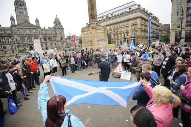 Supporters of the YES campaign gather in George Square. Picture: Greg Macvean