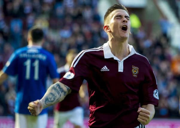 Hearts' Jamie Walker celebrates after making it 2-1 to the home side. Picture: SNS