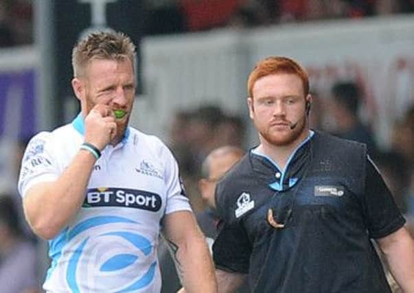 Glasgow Warriors' Tyrone Holmes walks off the pitch after being red carded. 

Photographer Ashley Crowden/CameraSport