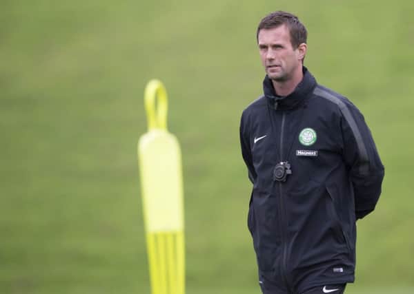 Celtic manager Ronny Deila oversees training at Lennoxtown. Picture: SNS