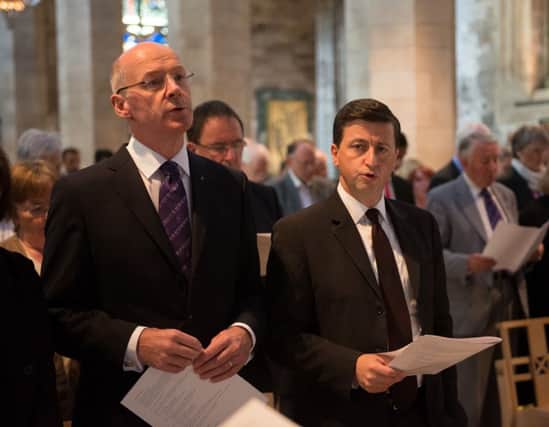 John Swinney (left) and Douglas Alexander at the service to promote unity in the wake of the referendum. Picture: PA