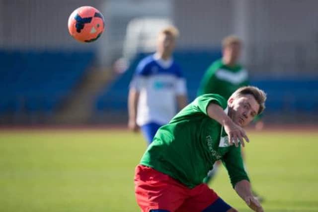 Ed Balls attempts to control the ball during the Journalists v Politicans match. Picture: Getty