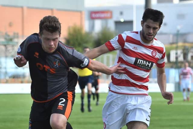 The Killie right-back (left) battles with Hamilton's Stephen Hendrie. Picture: SNS