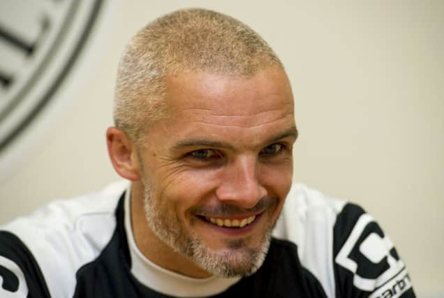 Jim Goodwin chats to the press ahead of the game against Partick Thistle. Picture: SNS