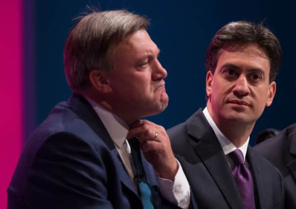 Ed Balls and Ed Miliband sit together on day two of the Labour Party Conference. Picture: Getty