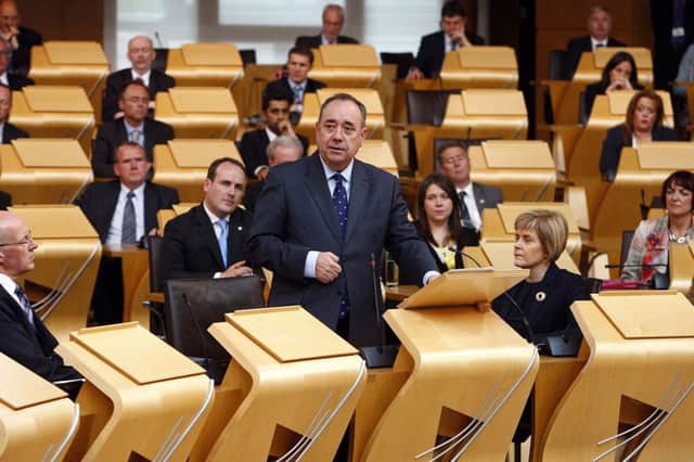 First Minister Alex Salmond addresses MSPs in the Scottish Parliament at Holyrood yesterday. Picture: Andrew Cowan