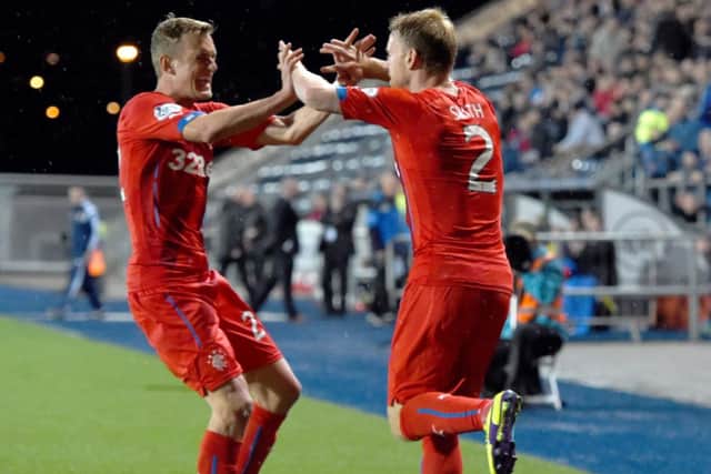 Dean Shiels (left) hails Steven Smith for his part in leveller. Picture: SNS