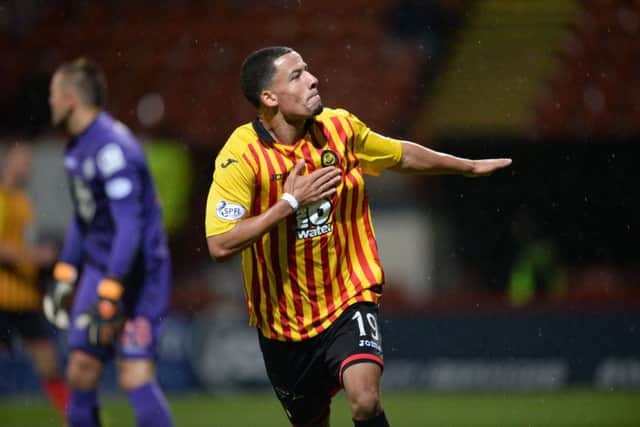 Nathan Eccleston celebrates his winning goal. Picture: SNS