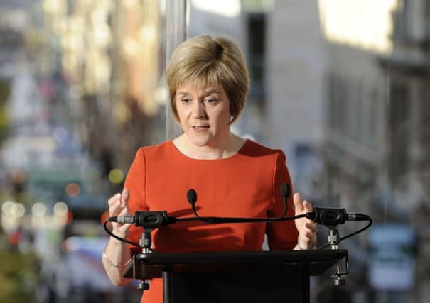 Nicola Sturgeon makes the annoucement about her leadership bid at the Glasgow Royal Concert Hall. Picture: John Devlin