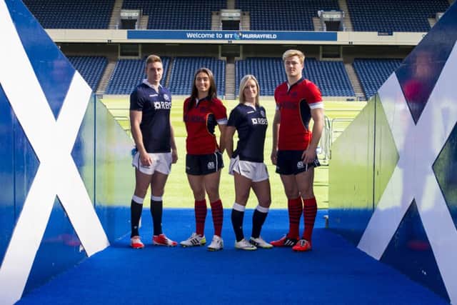 Scotlands Dougie Fife, Emma Wassell, Laura Steven and David Denton launch the red alternate kit. Picture: SNS