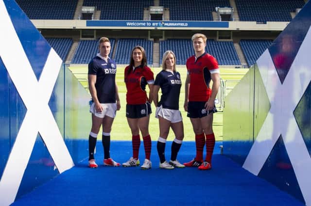 Scotlands Dougie Fife, Emma Wassell, Laura Steven and David Denton launch the red alternate kit. Picture: SNS