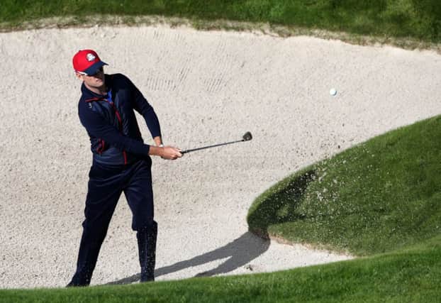 Zach Johnson plays out the bunker during practice. Picture: PA