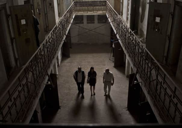 People walk inside Ramnicu Sarat prison. Picture: Getty