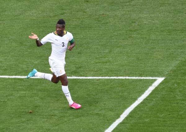Asamoah Gyan pictured during the 2014 World Cup match between Portugal and Ghana. Picture: AFP/Getty