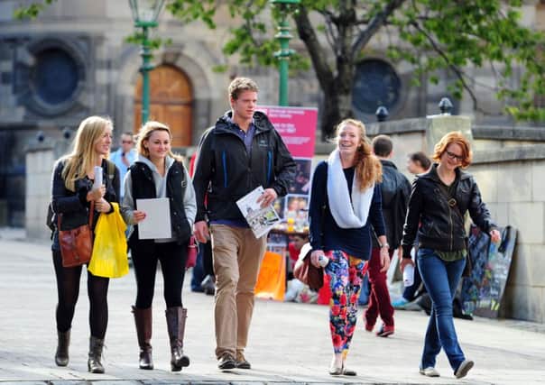 Students enjoy the late September sunshine near Teviot House in Bristo Square, Edinburgh. Picture: Ian Rutherford