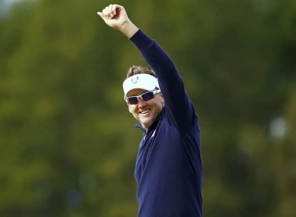 Ian Poulter reacts after holing a putt on the eighth green during practice at Gleneagles yesterday. Picture: Reuters