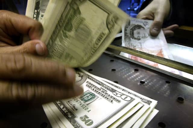The pound was slightly down against a resurgent US dollar at 1.63. Picture: Getty