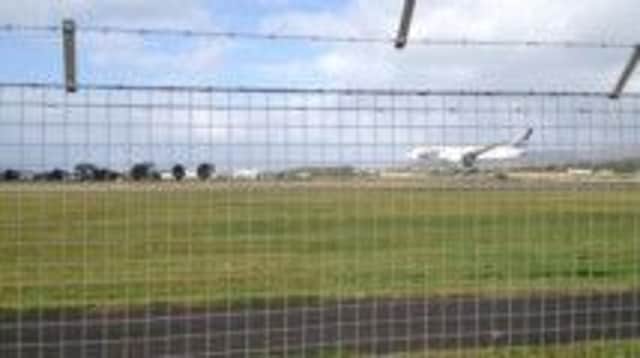 A Dreamliner plane making an emergency landing at Glasgow airport. Picture: HeMedia
