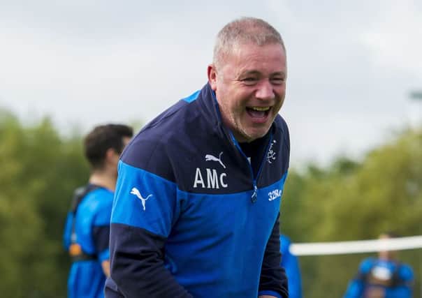 Ally McCoist has a laugh at Murray Park as Rangers prepare for their clash with Hibs. Picture: SNS
