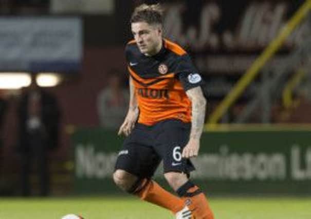 Dundee United's Paul Paton in action against Dundee. Picture: SNS