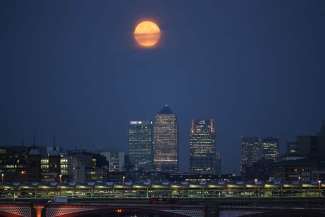 'Supermoon over Canary Wharf could foreshadow particularly large banking fines. Picture:Getty