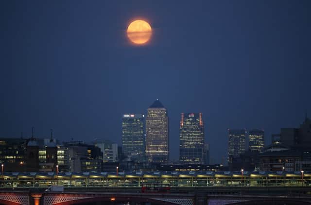 'Supermoon over Canary Wharf could foreshadow particularly large banking fines. Picture:Getty