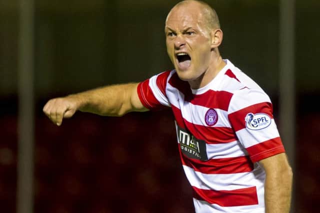 Hamilton player/manager Alex Neil in action against Motherwell. Picture: SNS