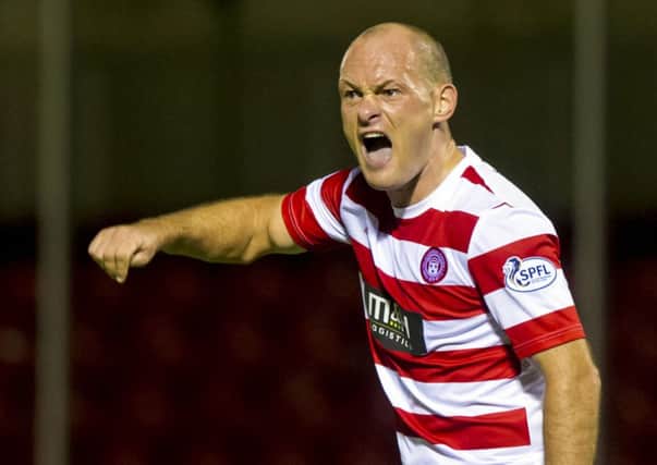 Hamilton player/manager Alex Neil in action against Motherwell. Picture: SNS