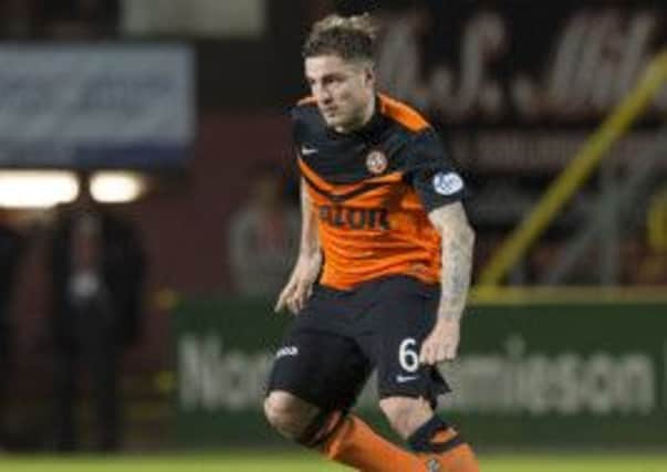 Dundee United's Paul Paton in action against Dundee. Picture: SNS