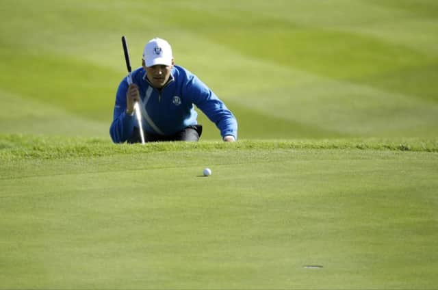 Martin Kaymer lines up a putt on the 18th green. Picture: AP