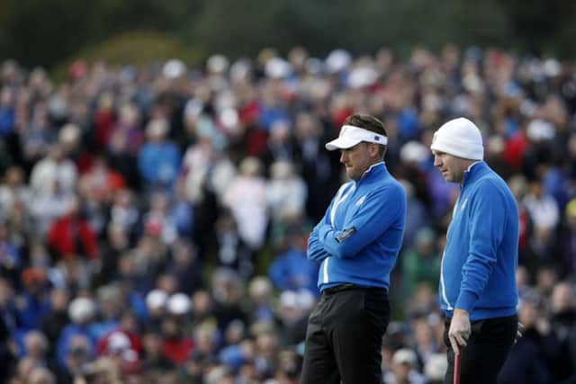 Ian Poulter, left, and Stephen Gallacher look pensive. Picture: Getty