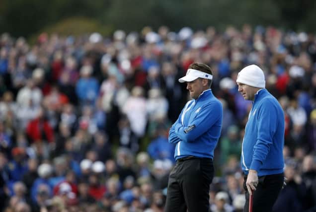 Ian Poulter, left, and Stephen Gallacher look pensive. Picture: Getty