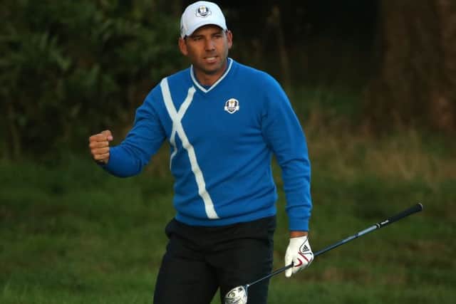 Sergio Garcia celebrates his approach shot to the 18th. Picture: Getty