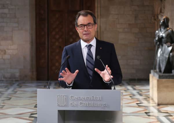 Artur Mas delivers a speech after signing the regional law to vote on independence on November 9. Picture: Getty