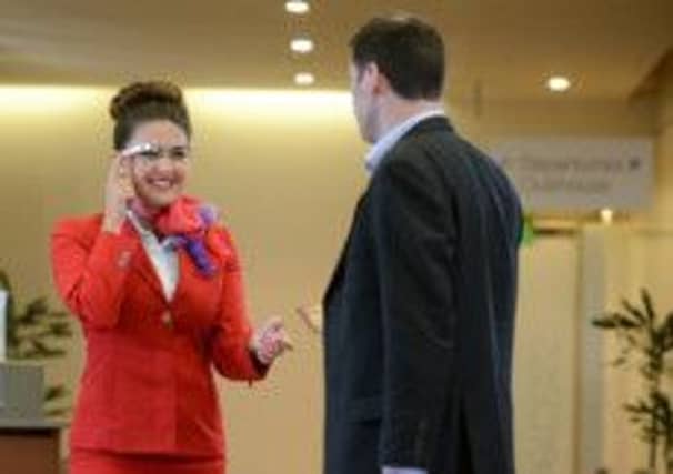 Virgin staff have already used Google Glass headsets to help them give more information to passengers. Picture: Contributed