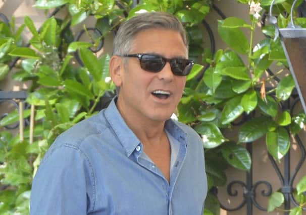 George Clooney looks in good spirits as he prepares for his marriage to lawyer Amal Alamuddin. Picture: Getty