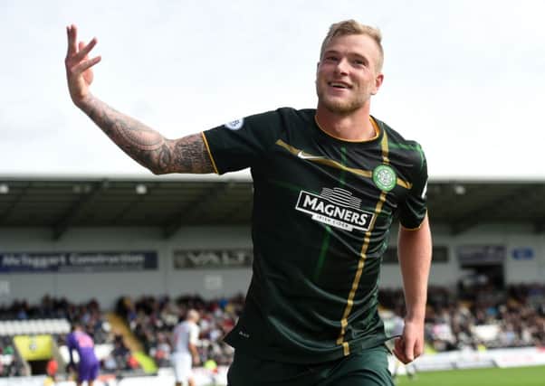 John Guidetti celebrates after scoring his and Celtic's second. Picture: SNS