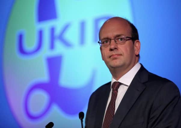 Mark Reckless addresses Ukip party members after defecting to Nigel Farage's party. Picture: Getty