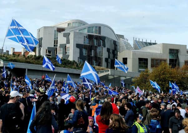 Yes Voters held a rally today at the Scottish Parliment, Holyrood, they along with the No voters will be scrutinising any deal for new powers closely. Picture: TSPL