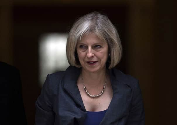 Earlier this month, May told the House of Commons new powers included prosecuting Britons involved in terrorism abroad in UK courts. Picture: Getty Images