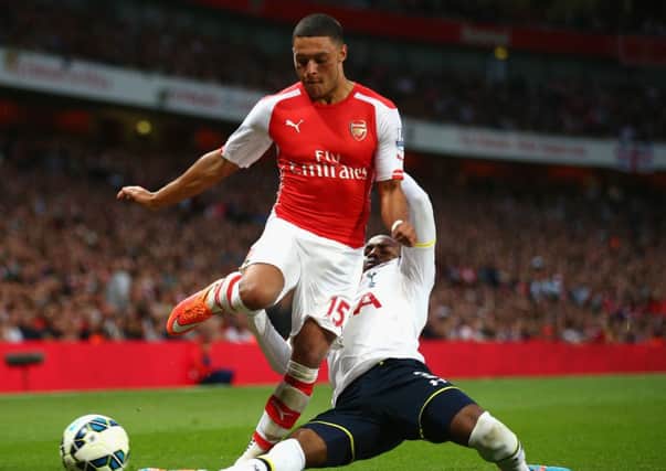 Danny Rose of Spurs tackles Alex Oxlade-Chamberlain. Picture: Getty