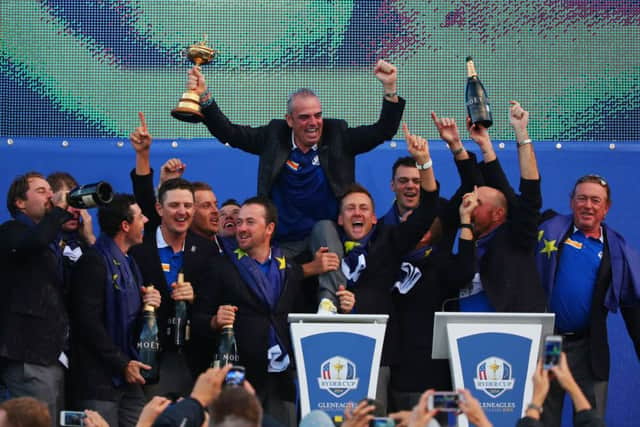 Paul McGinley celebrates winning the Ryder Cup with his team. Picture: Getty