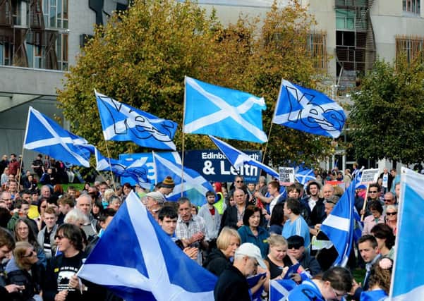 Pro-independence supporters gather outside Holyrood at the weekend. Picture: Lisa Ferguson