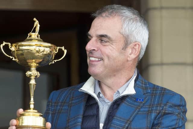 European captain Paul McGinley as he shows off the Ryder Cup. Picture: SNS