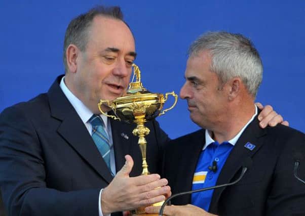 First Minister Alex Salmond and Paul McGinley celebrate Europe's Ryder Cup win. Picture: Jane Barlow