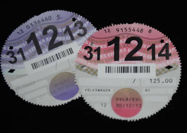 The disc was introduced in 1921, but from Wednesday there will be no need for motorists to display the vehicle excise duty (VED) disc on their car windscreens. Picture: TSPL