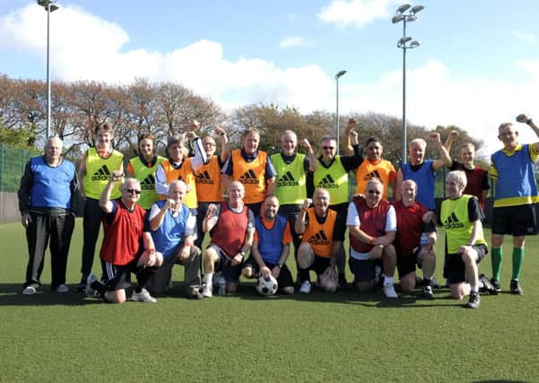 Walking Football players assembled at Glasgow Green Football Centre. Picture: John Devlin