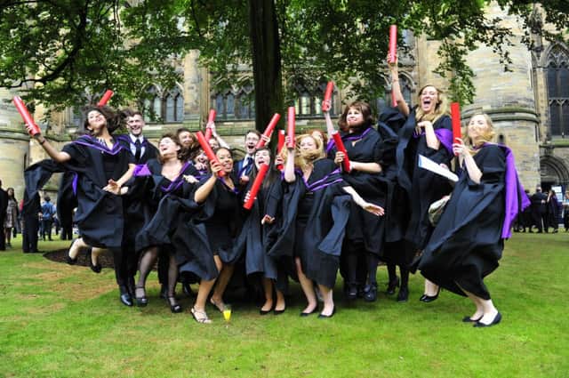 Graduates celebrate at Glasgow University. Picture: Robert Perry
