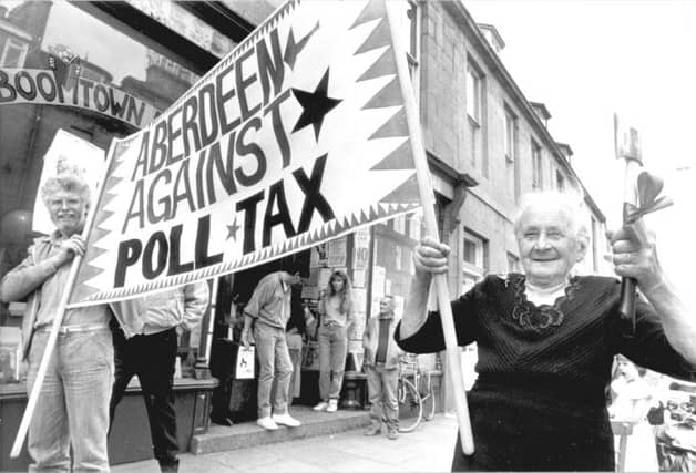 Scotland's anti-poll tax campaigners take to the streets of Aberdeen. Picture: Newsline
