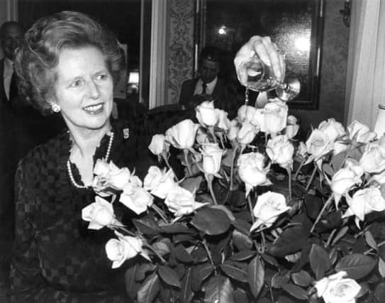 Margaret Thatcher christens a new variety of rose named in her honour by the German Horticultural Society. Picture: Getty